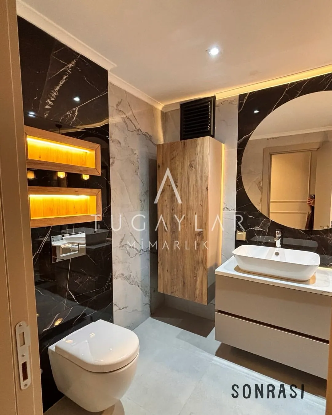 Lara anahtar teslim banyo yenileme projesi sonrası modern gömme rezervuaz, led aydınlatmalı niş ve özel ölçü dolaplar